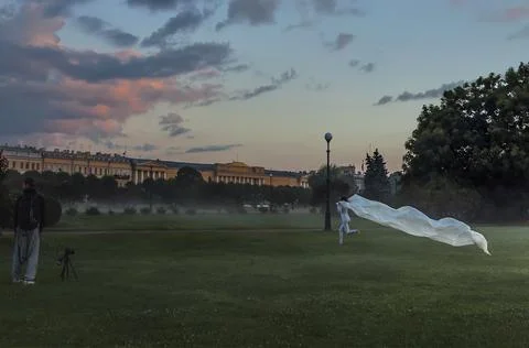Staged shooting on the Champ de Mars on a foggy summer morning. Stock Photos