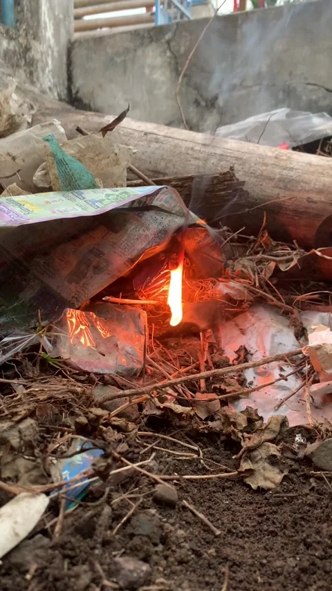 Stages of fire that burns garbage Stock Footage 241535923