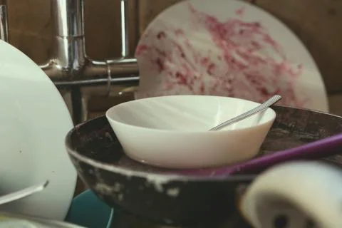 Stained Dirty Dishes In Kitchen Sink Stock Photos