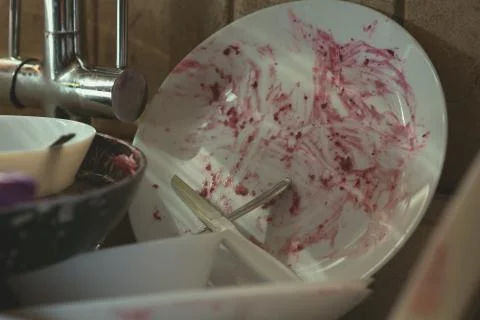 Stained Dirty Dishes In Kitchen Sink Stock Photos