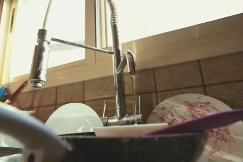 Stained Dirty Dishes In Kitchen Sink Stock Photos