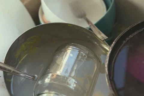 Stained Dirty Dishes In Kitchen Sink Stock Photos