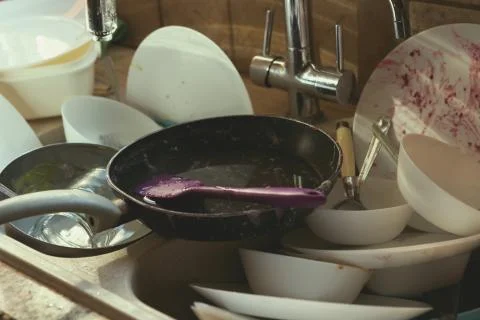 Stained Dirty Dishes In Kitchen Sink Stock Photos