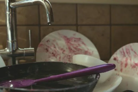 Stained Dirty Dishes In Kitchen Sink Stock Photos