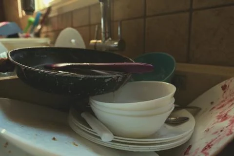 Stained Dirty Dishes In Kitchen Sink Stock Photos