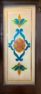 Stained Glass Floral Panel Inserted in Dark Wooden Door Frame Stock Photos