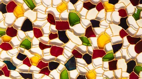 Stained glass with multi-colored inserts. Abstract background Stock Photos