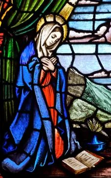 Stained glass scene of the virgin mary Stock Photos