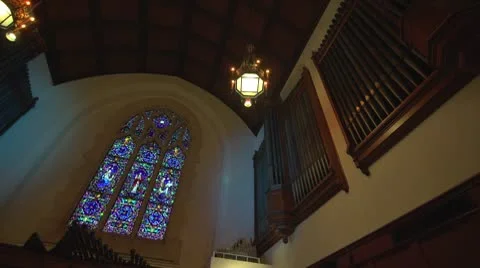 Stained glass window and pipe organ (untrimmed) Stock Footage 10712949