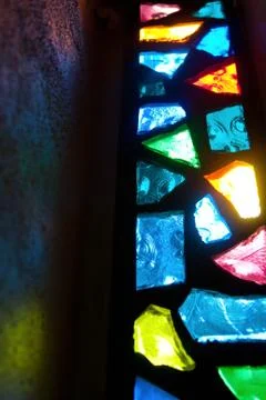 Stained Glass Window Casting Light On Wall Stock Photos