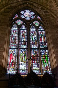 Stained glass window inside Notre Dame Cathedral in Paris France 库存照片