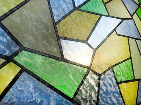 Stained glass on the window. Stock Photos