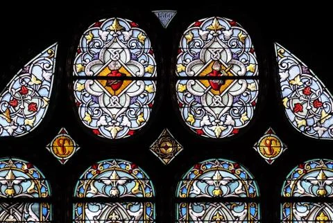 Stained glass window in Saint Eustache church in Paris Stock Photos