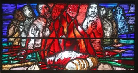 Stained glass window by Sieger Koder in St. John church in Piflas, Germany Stock Photos