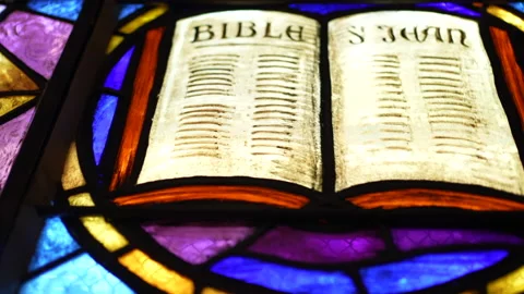 Stained glass windows with Bible scriptures represented. Christian culture 스톡 동영상 235354781