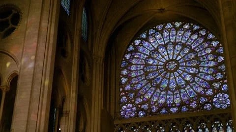 Stained Glass Windows Inside The Notre Dame Cathedral In Paris, France Stock Footage 158679401