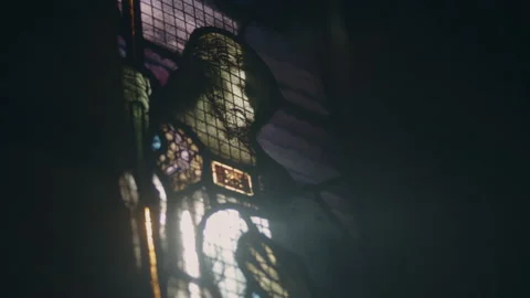 Stained glass windows in shape of Jesus Christ in Church Stock Footage 151725432