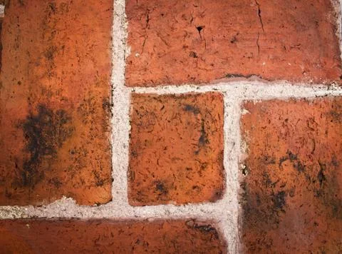 Stained old brick wall background Stock Photos