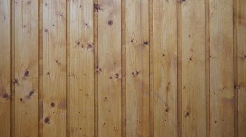 Stained wood background with vertical wooden board panelling brown stained... Stock Photos