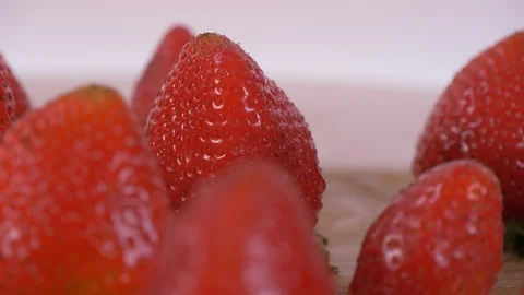 Staining Strawberries Rotating over white Background. Strawberry, Fruit 스톡 동영상 127937503