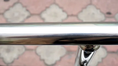 Stainless chrome steel railing on the open porch , close-up Stock Footage 112586534