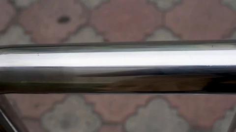 Stainless chrome steel railing on the open porch , close-up Stock Footage 112586535