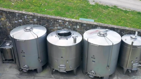 Stainless clean tanks of different sizes and with different regulation buttons Stock-Footage 317399559