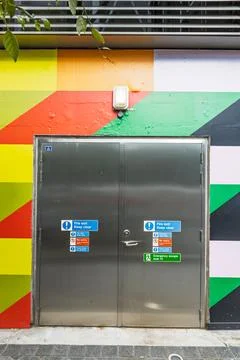 Stainless Fire Exit Door with Safety Signage Stock Photos