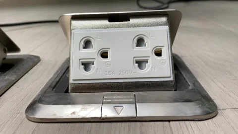 Stainless floor box outlet plug socket power supply close up shot, Thailand Video stock 248413356