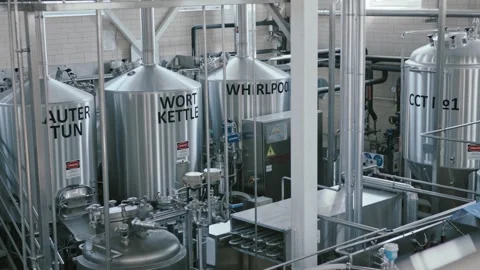 Stainless steel brewery equipment processing beer Stock Footage 337411491