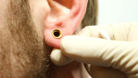 Stainless Steel Ear Expander Stock Footage 93545587