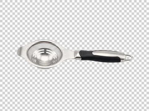 Stainless steel egg separator kitchen tool with fine mesh strainer. 库存照片
