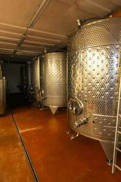Stainless steel fermentation tanks processing wine in Hnanice, Czechia Stock Photos