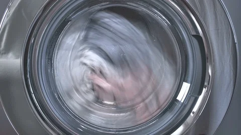 Stainless steel front loading washer close up Stock Footage 106078623