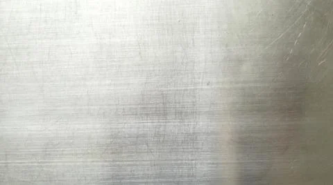 Stainless steel large sheet  With light hitting the surface  For background Stock Photos