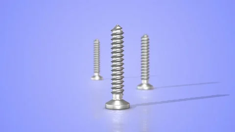 Stainless Steel Self Tapping Screws on a Reflective Floor. Steel Screws 3D. 4K Stock Footage 290219490