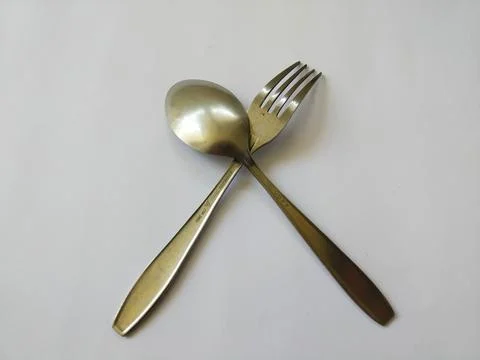 Stainless steel spoon and fork crossed Stock Photos