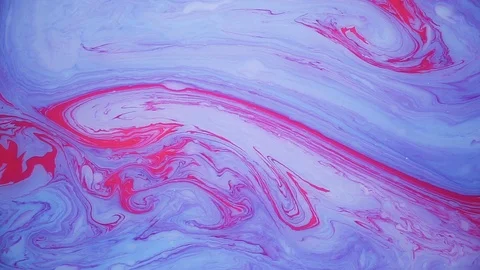 Stains of blue and violet ink on the water. Abstract background footage. Stock Footage 96232514