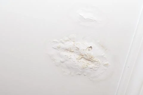 Stains on the ceiling a result of leaking rain water roof. House insurance. Stock Photos
