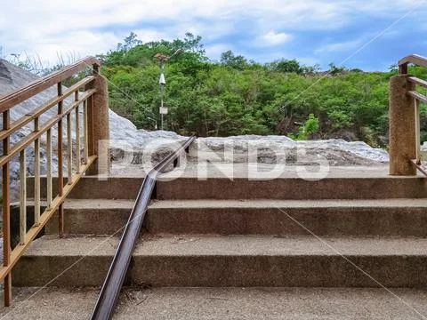 Photograph: Stair-safe bike ramp along stairs. Comfortable and safe ...