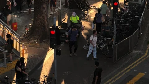 Stair from a train station when sun is setting, cigarette bin with smokers 10 Stock Footage 254239750