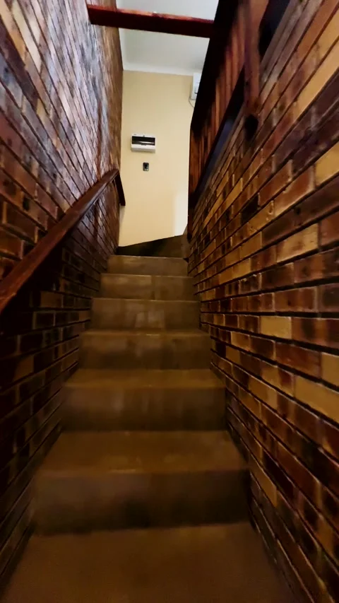 Staircase in a brick building Stock Footage 325451743