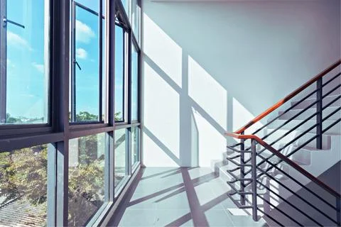 Staircase inside the building and sunlight Stock Photos