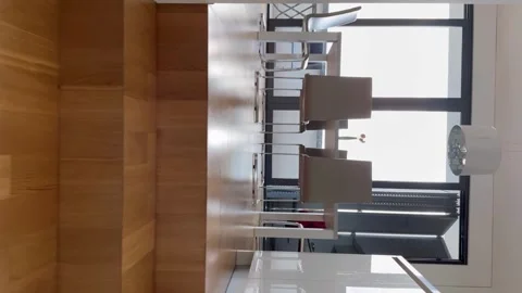 A staircase made of wood with a view of a dining room. The dining room has a Stock Footage 278062272