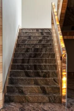 Staircase with marble railing glowing Stock Photos