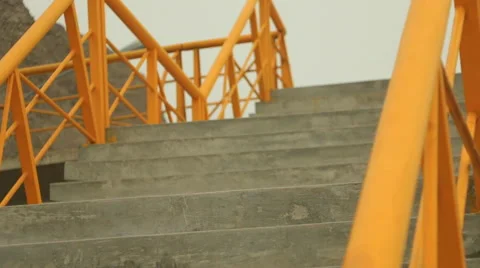 Stairs and psychedelic railing structure to modern overpass Stock Footage 48915095