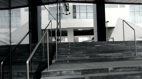 Stairs and reflective wall view in modern business district, dolly shot Stock Footage 150957519