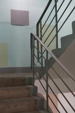 Stairs in case of fire inside the building. Steps and railings are visible. Stock Photos