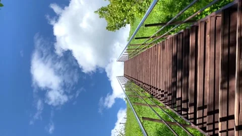 Stairs to the clouds surrounded by trees. summer. concept. success Video stock 196606536