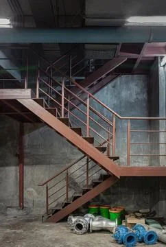 Stairs down to Cold water machine control room in the basement. Stock Photos